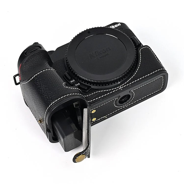 For Nikon Z30 / Z50 Battery Opening Design PU Leather Camera Cover Palm Texture Half Body Bottom Case with Wrist Strap
