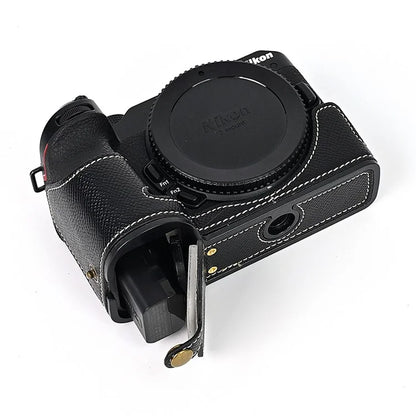 For Nikon Z30 / Z50 Battery Opening Design PU Leather Camera Cover Palm Texture Half Body Bottom Case with Wrist Strap