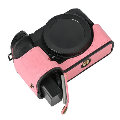 For Nikon Z30 / Z50 Battery Opening Design PU Leather Camera Cover Palm Texture Half Body Bottom Case with Wrist Strap