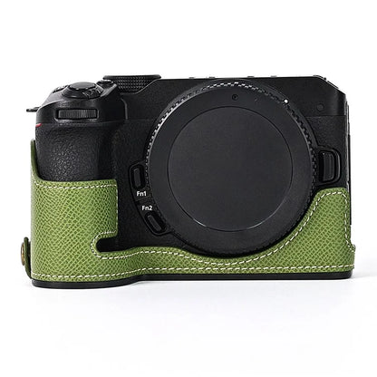For Nikon Z30 / Z50 Battery Opening Design PU Leather Camera Cover Palm Texture Half Body Bottom Case with Wrist Strap