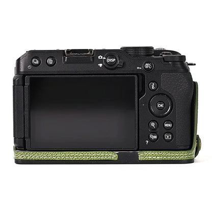 For Nikon Z30 / Z50 Battery Opening Design PU Leather Camera Cover Palm Texture Half Body Bottom Case with Wrist Strap