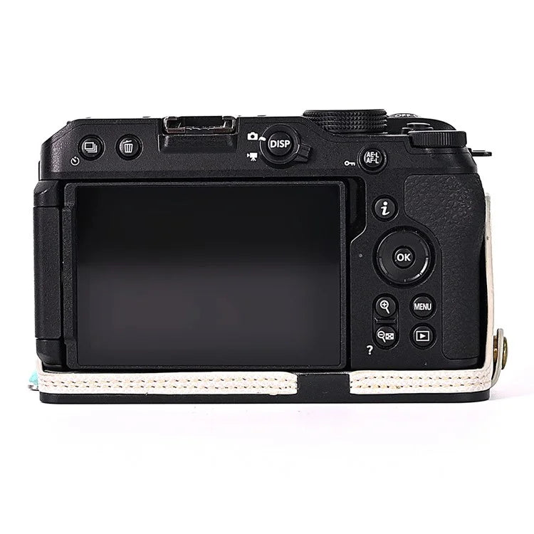 For Nikon Z30 / Z50 Battery Opening Design PU Leather Camera Cover Palm Texture Half Body Bottom Case with Wrist Strap