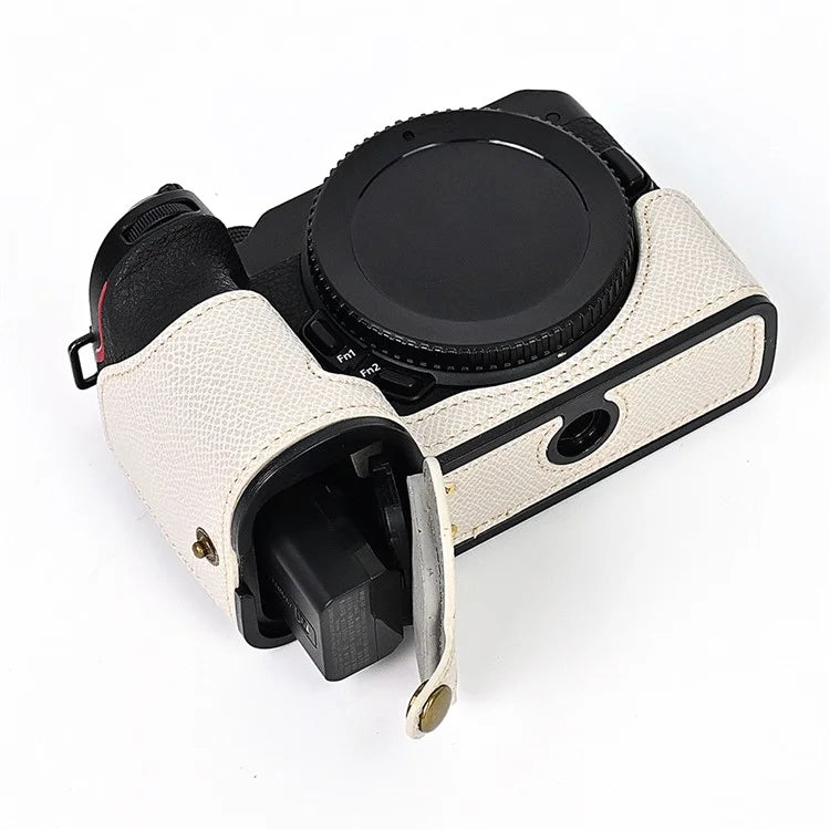 For Nikon Z30 / Z50 Battery Opening Design PU Leather Camera Cover Palm Texture Half Body Bottom Case with Wrist Strap