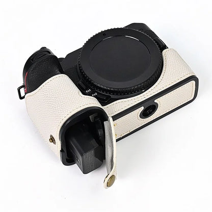 For Nikon Z30 / Z50 Battery Opening Design PU Leather Camera Cover Palm Texture Half Body Bottom Case with Wrist Strap