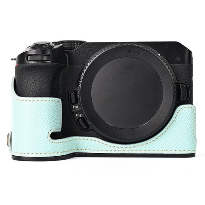 For Nikon Z30 / Z50 Battery Opening Design PU Leather Camera Cover Palm Texture Half Body Bottom Case with Wrist Strap