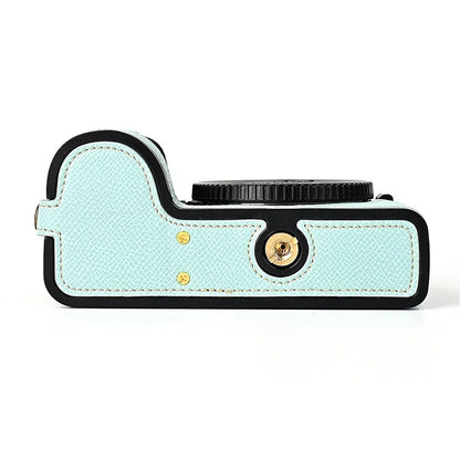 For Nikon Z30 / Z50 Battery Opening Design PU Leather Camera Cover Palm Texture Half Body Bottom Case with Wrist Strap