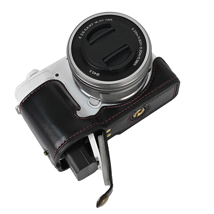 For Sony ZV-E10 Battery Opening Design PU Leather Camera Cover Half Body Bottom Case with Wrist Strap