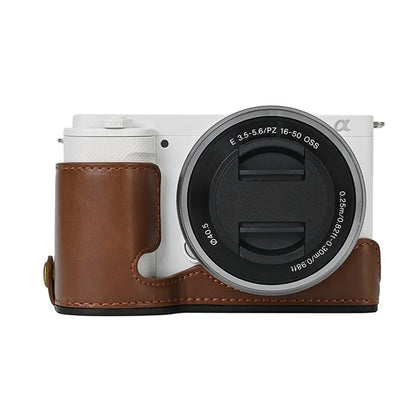 For Sony ZV-E10 Battery Opening Design PU Leather Camera Cover Half Body Bottom Case with Wrist Strap