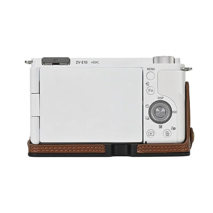 For Sony ZV-E10 Battery Opening Design PU Leather Camera Cover Half Body Bottom Case with Wrist Strap