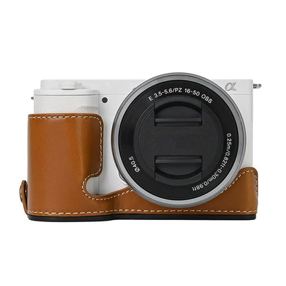 For Sony ZV-E10 Battery Opening Design PU Leather Camera Cover Half Body Bottom Case with Wrist Strap