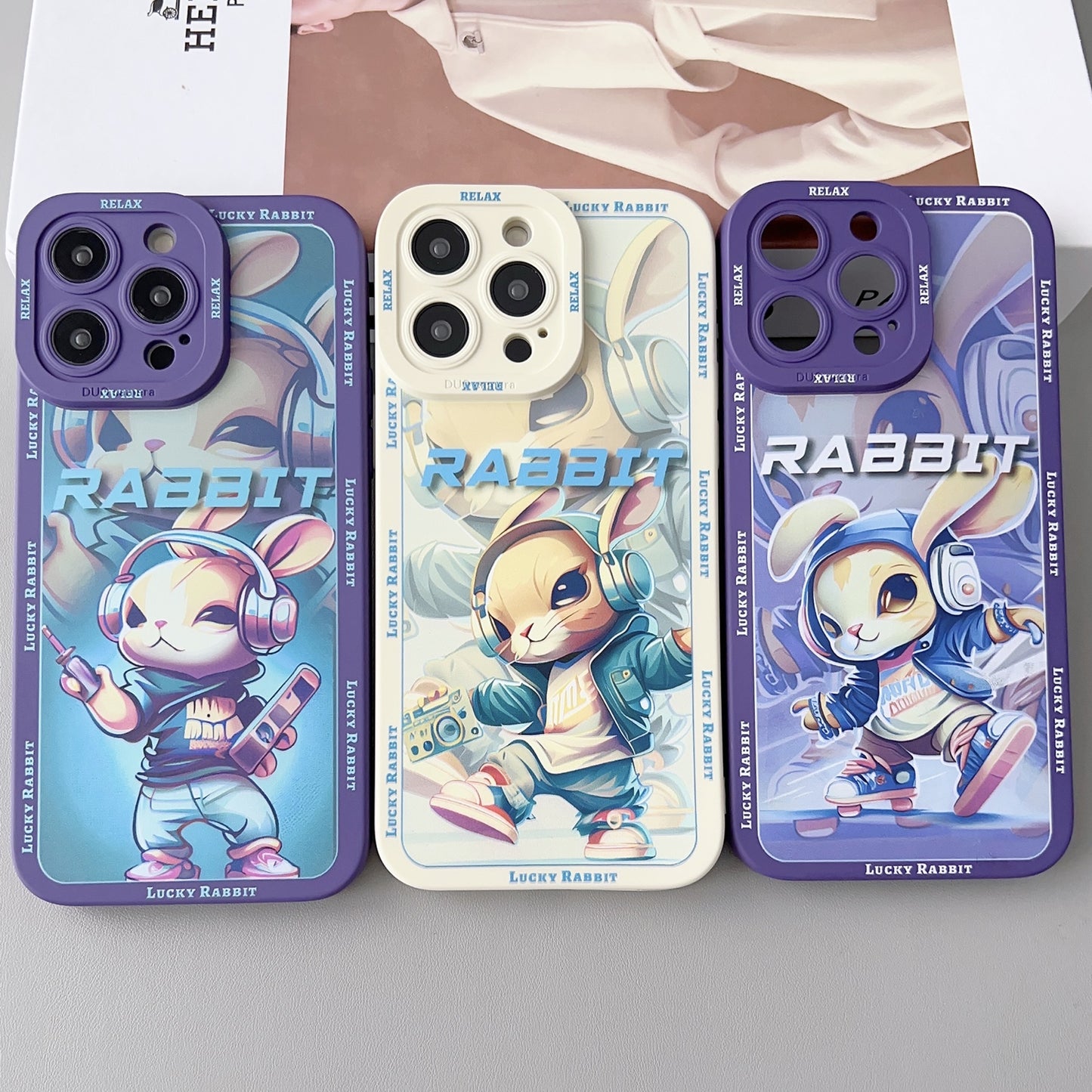 ELECTROPRIME For iPhone 15 Liquid Angel Eyes Hip Hop Rabbit TPU Phone Case(Purple Earphones)