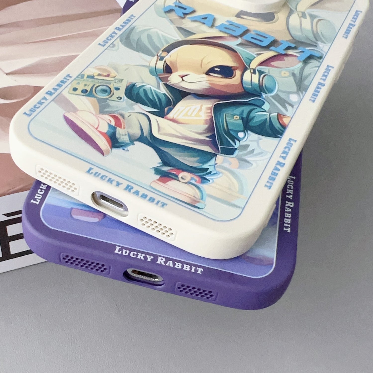 ELECTROPRIME For iPhone 15 Liquid Angel Eyes Hip Hop Rabbit TPU Phone Case(Purple Earphones)