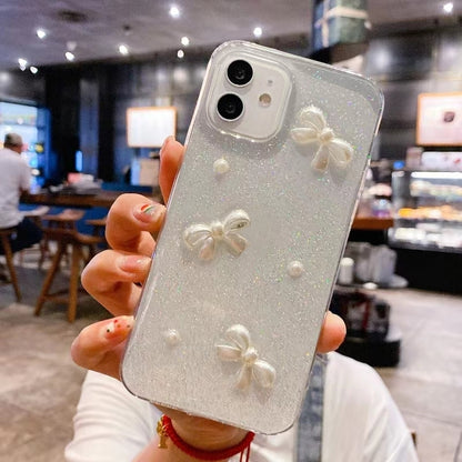 ELECTROPRIME For iPhone 15 Pearl Bow Glitter Epoxy TPU Phone Case(Cross Knots)