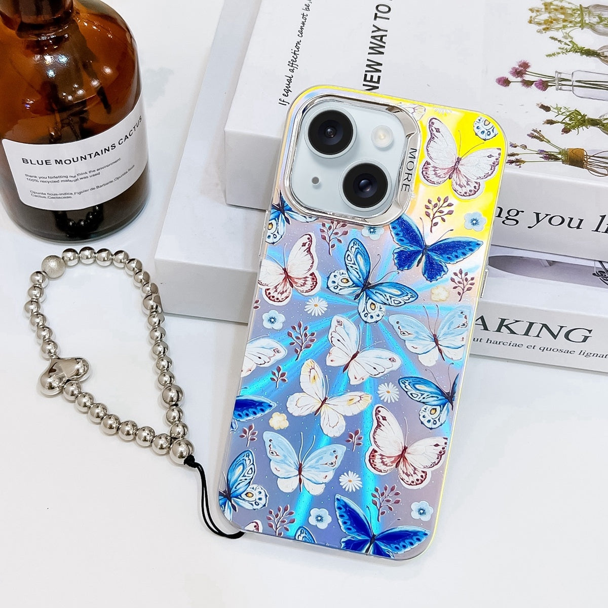 ELECTROPRIME For iPhone 15 Electroplating Laser Butterfly Phone Case with Wrist Strap(Blue Butterflies AB4)