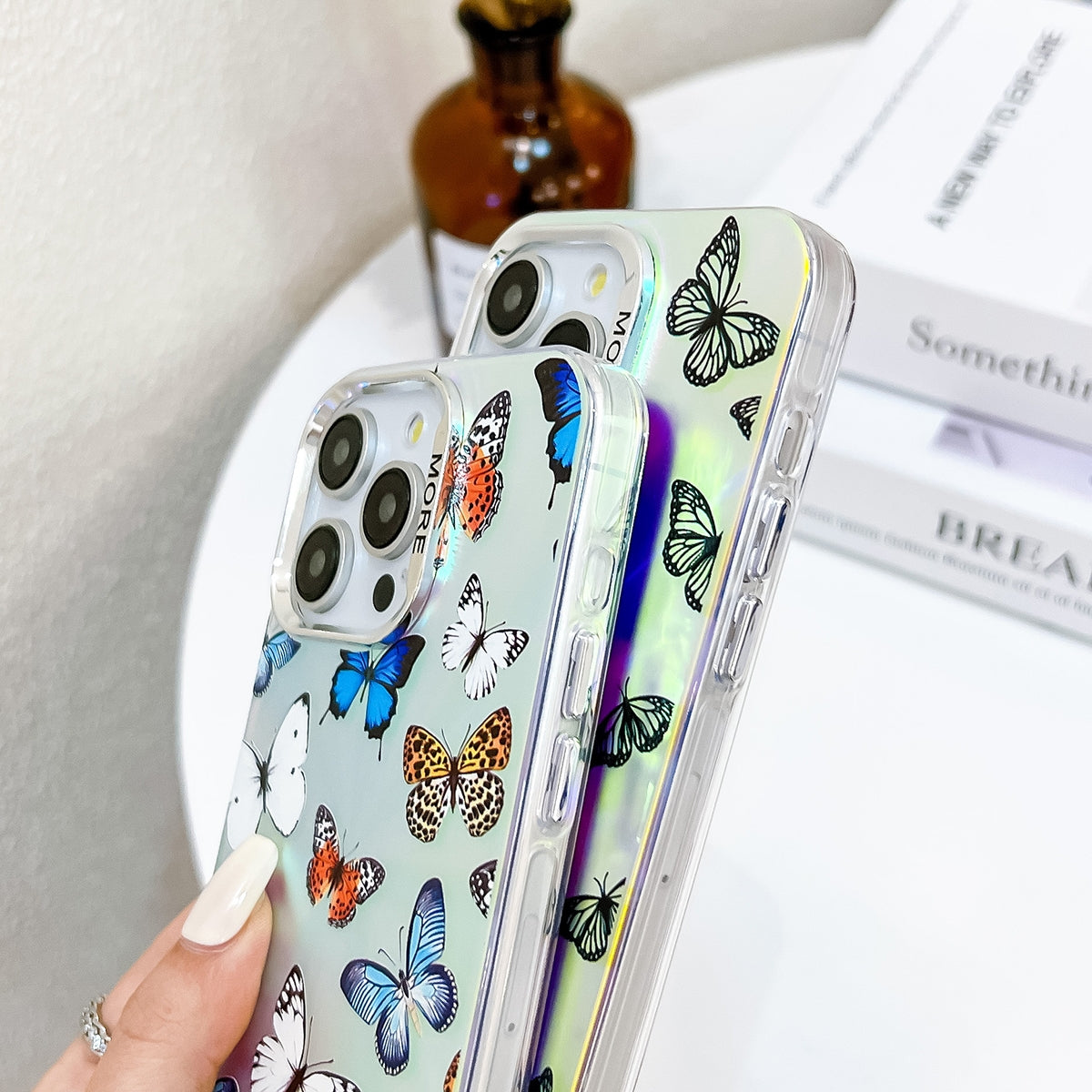 ELECTROPRIME For iPhone 15 Electroplating Laser Butterfly Phone Case with Wrist Strap(White Purple Butterflies AB6)