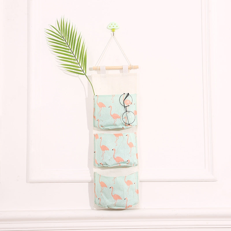 ELECTROPRIME Cotton Linen Hanging Storage Bag 3 Pockets Wall Mounted Wardrobe Hang Bag Wall Pouch Cosmetic Toys Organizer(Green flamingo)