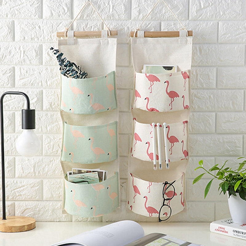 ELECTROPRIME Cotton Linen Hanging Storage Bag 3 Pockets Wall Mounted Wardrobe Hang Bag Wall Pouch Cosmetic Toys Organizer(Green flamingo)