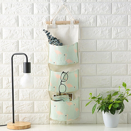 ELECTROPRIME Cotton Linen Hanging Storage Bag 3 Pockets Wall Mounted Wardrobe Hang Bag Wall Pouch Cosmetic Toys Organizer(Green flamingo)
