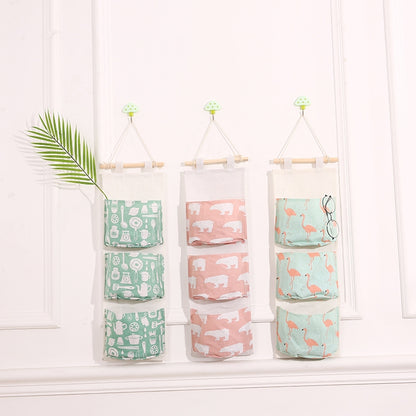 ELECTROPRIME Cotton Linen Hanging Storage Bag 3 Pockets Wall Mounted Wardrobe Hang Bag Wall Pouch Cosmetic Toys Organizer(Green flamingo)